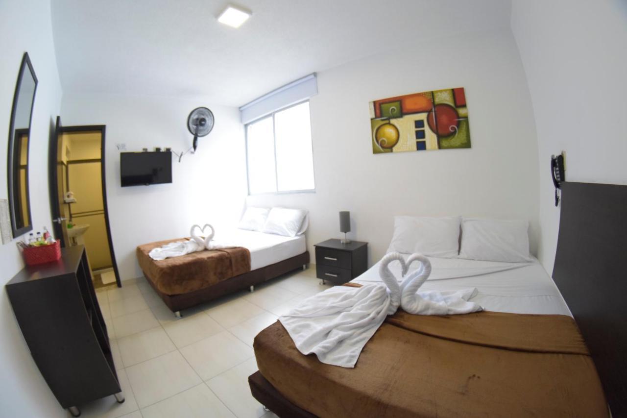 Hotel Golden Suite Pereira Bagian luar foto