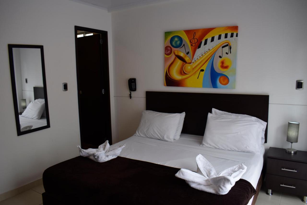Hotel Golden Suite Pereira Bagian luar foto