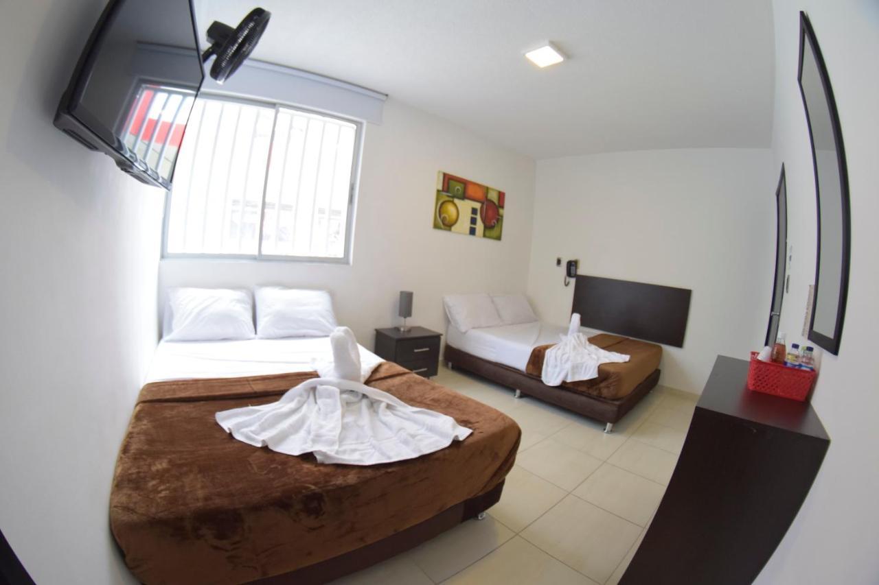 Hotel Golden Suite Pereira Bagian luar foto