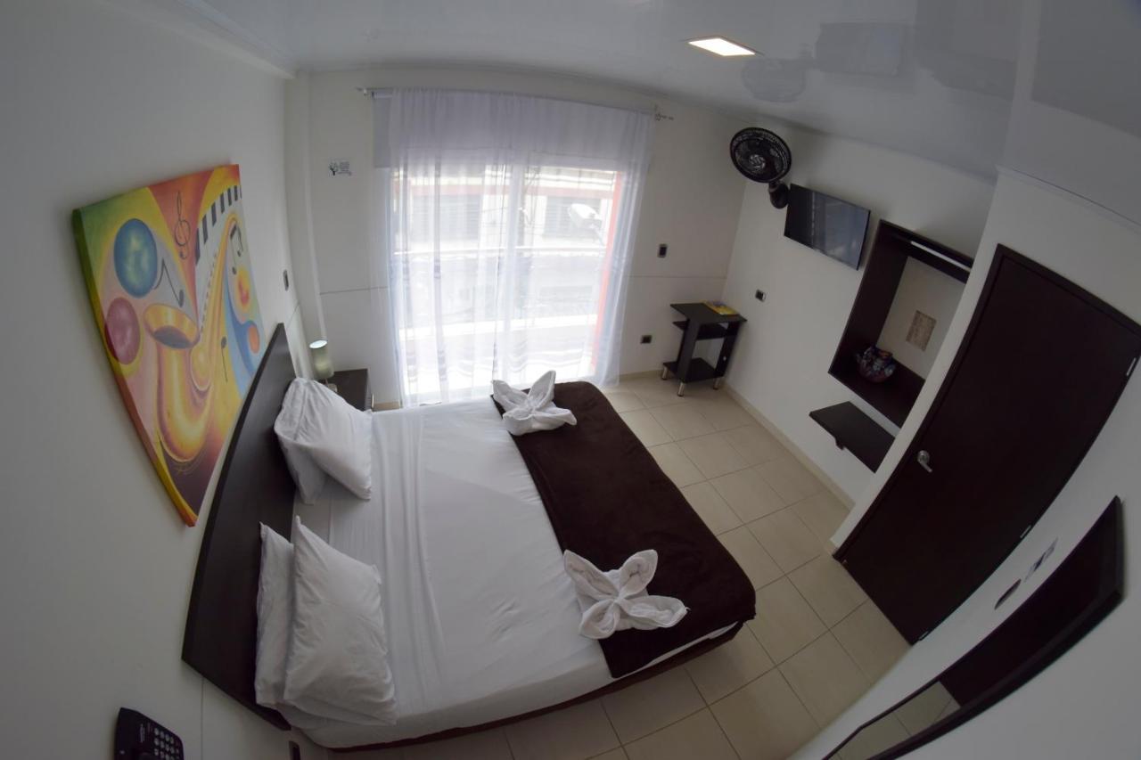 Hotel Golden Suite Pereira Bagian luar foto
