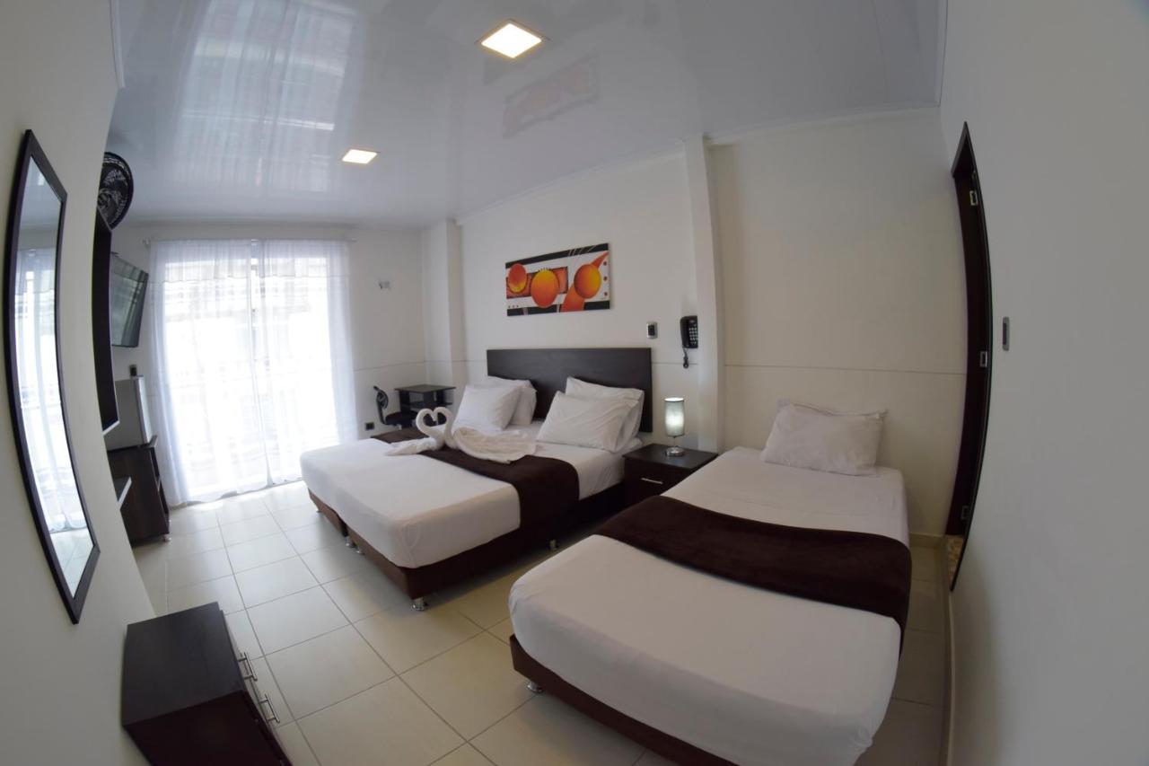 Hotel Golden Suite Pereira Bagian luar foto